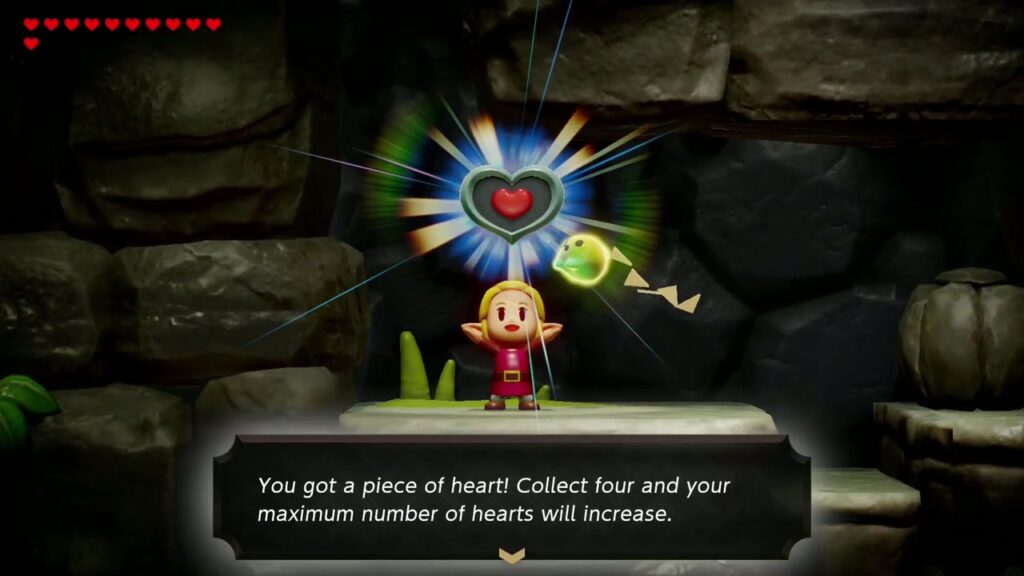 Zelda hält das Herzteil auf dem Höhlenvorsprung hoch, nachdem sie durch das Holmill-Loch gestürzt ist.