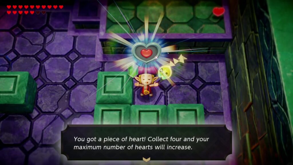 Zelda hält das Herzteil in Smogs Zimmer im östlichen Tempel hoch.