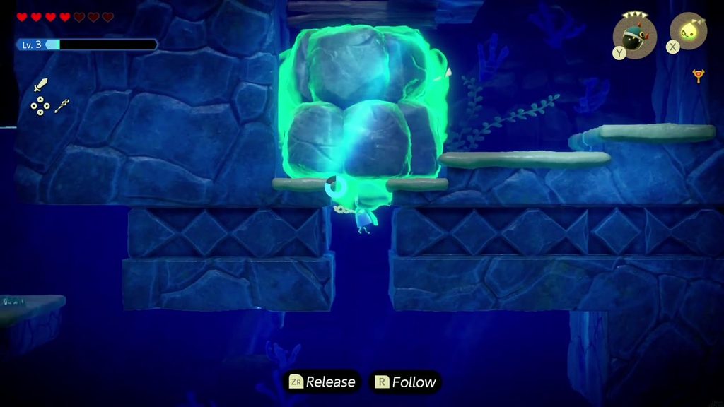 Zelda Binds the stacked boulders aside again to swim back up through the gap in the ledge.