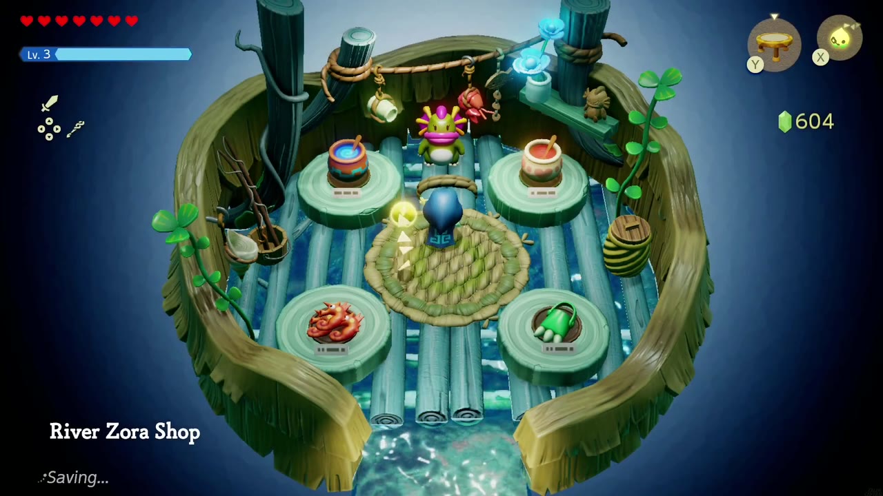 Inside the River Zora Shop hut in River Zora Village, with the Zora shopkeeper behind round counters Inside the River Zora Shop hut in River Zora Village, with the Zora shopkeeper behind round counters