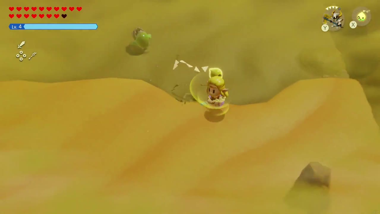 Rocks burst up out of the sand around Zelda as the Lanmola nears. Rocks burst up out of the sand around Zelda as the Lanmola nears.
