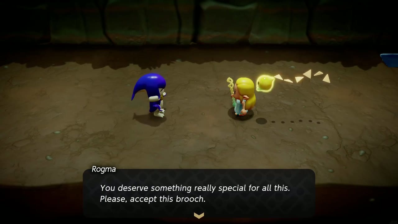 Rogma tells Zelda she deserves something really special and asks her to accept a brooch Rogma tells Zelda she deserves something really special and asks her to accept a brooch