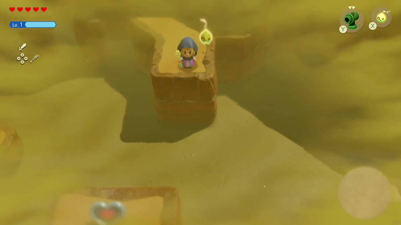 A Rift in the Gerudo Desert - The Legend of Zelda: Echoes of Wisdom Walkthrough 116 Zelda on a high sandstone ledge in the Gerudo sandstorm, the Piece of Heart on a block below