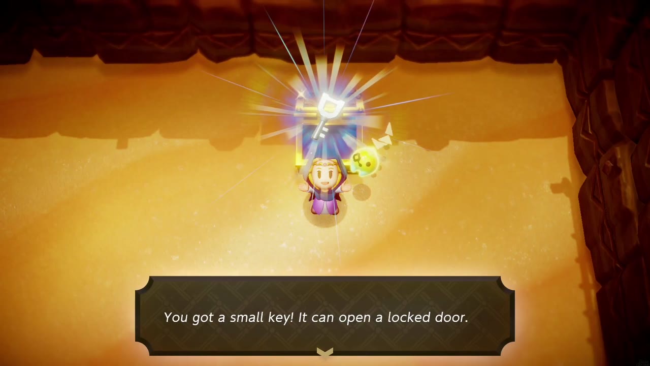A Rift in the Gerudo Desert - The Legend of Zelda: Echoes of Wisdom Walkthrough 100 Zelda holds up the Small Key won from the chest in Cryptic Cavern.