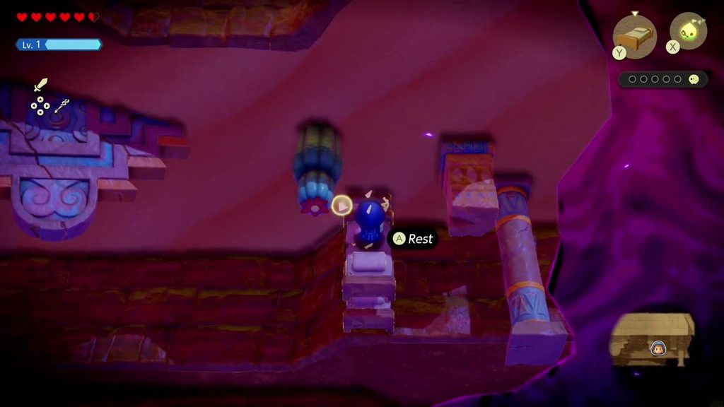 A Rift in the Gerudo Desert - The Legend of Zelda: Echoes of Wisdom Walkthrough 66 Zelda stands on stacked Old Bed echoes beside a tall pillar below the Still World ledge.