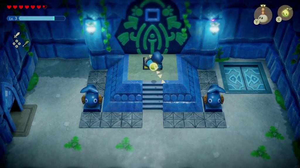 Zelda steps onto the blue switch at the top of the stairs.