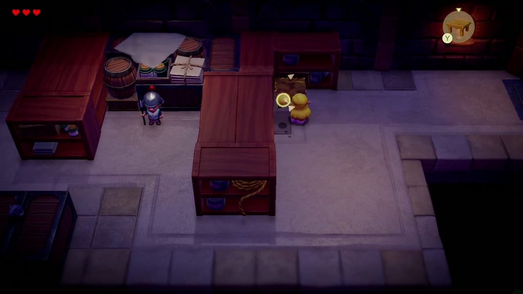 Zelda summons a Table beside a storeroom shelving unit in the Hyrule Castle dungeon to climb past the guard