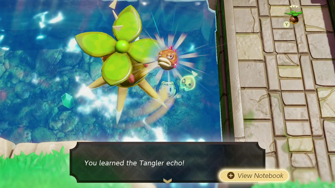 Zelda aprende o eco dos Tanglers enquanto nada em um rio perto de uma ponte de pedra no Lago Hylia. Zelda aprende o eco dos Tanglers enquanto nada em um rio perto de uma ponte de pedra no Lago Hylia.