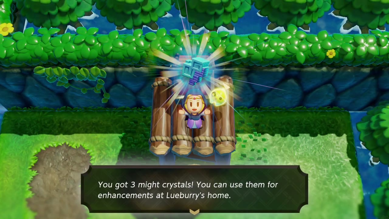 Zelda stands atop a log tower holding three might crystals, 'You got 3 might crystals!' box below, trampolines at its foot