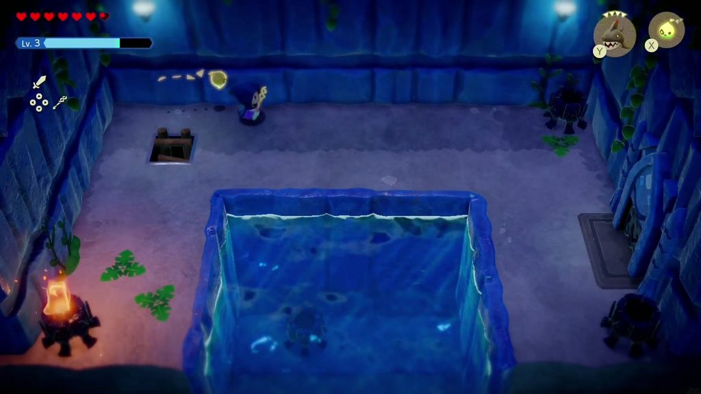 The torch room's pool in Jabul Ruins, with a sunken torch visible under the water.