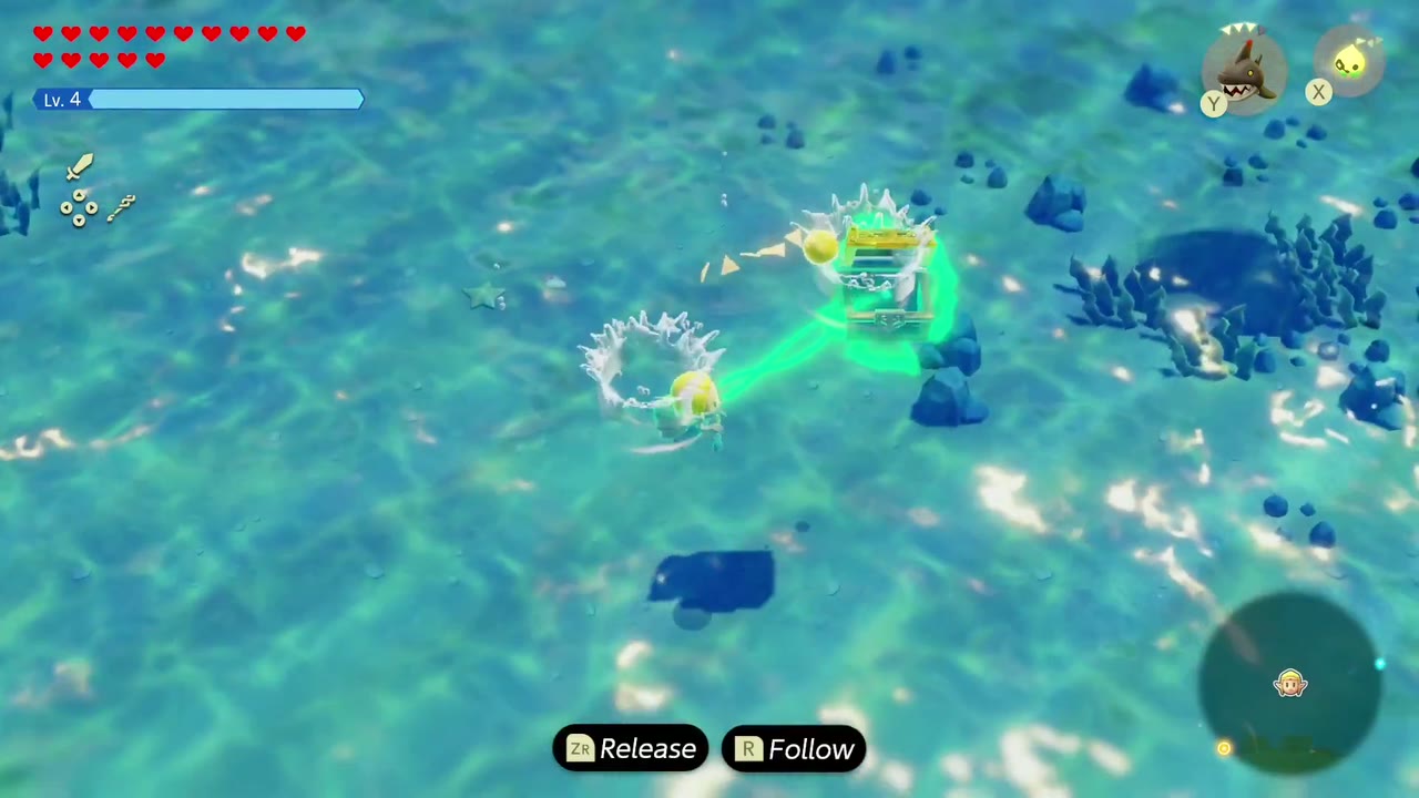 Zelda tows a bound treasure chest through the sea for the Precious Treasure side quest. Zelda tows a bound treasure chest through the sea for the Precious Treasure side quest.