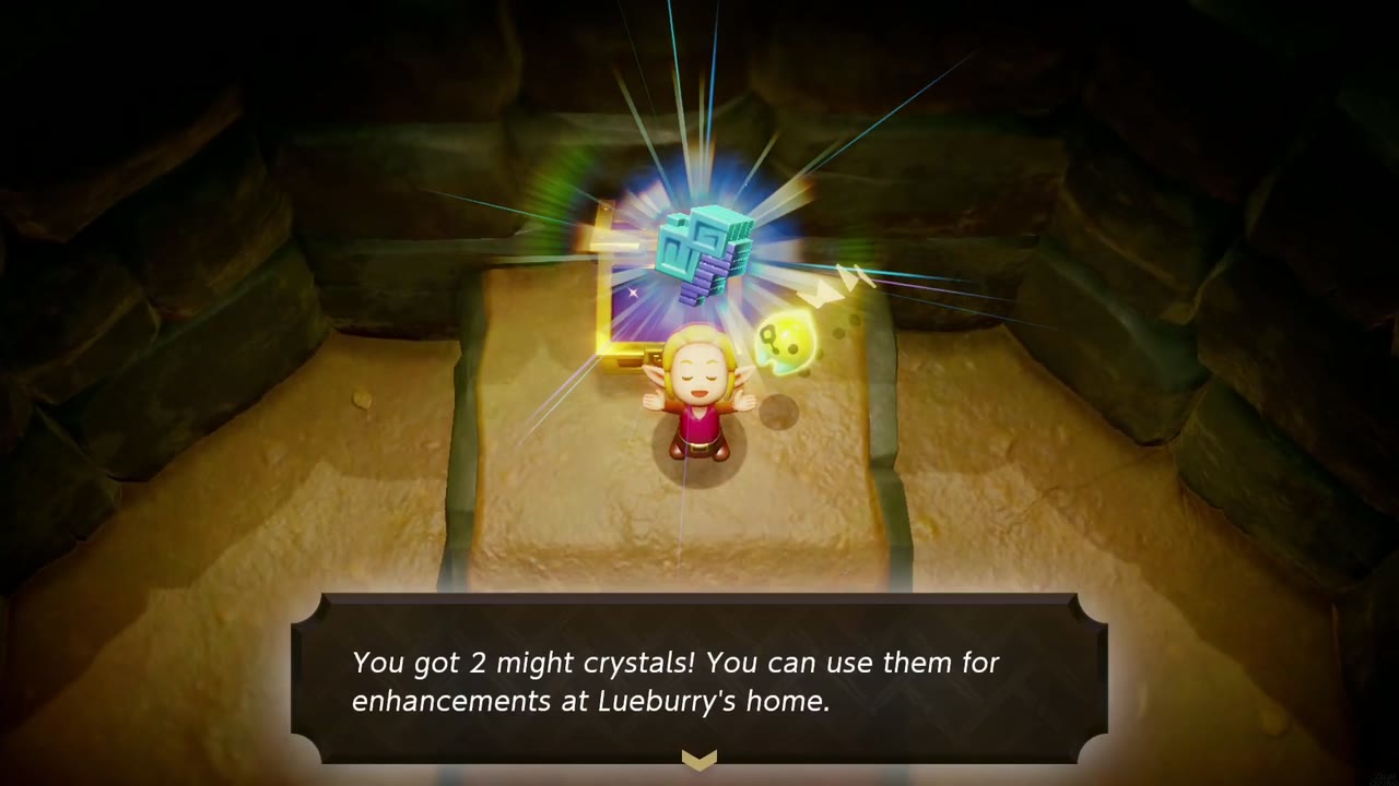 In a dim earthen cellar, Zelda stands before an open chest holding two might crystals; 'You got 2 might crystals!' box