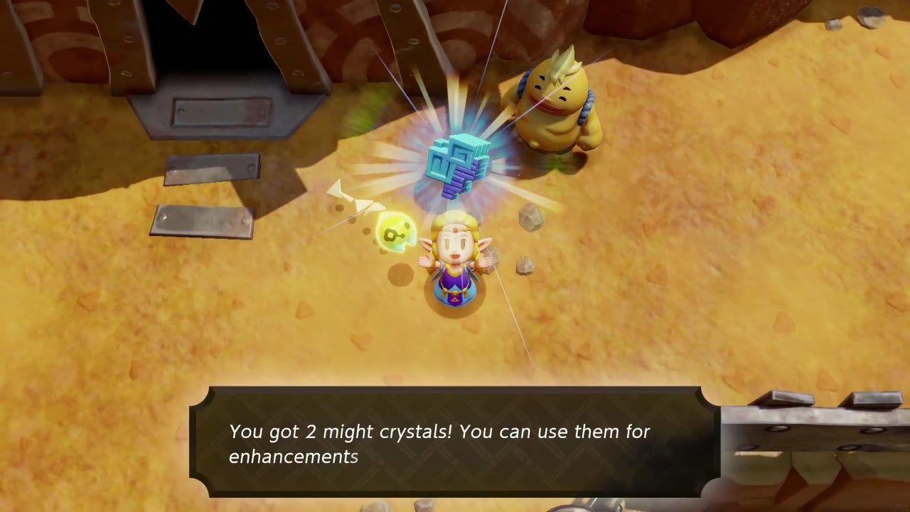 Zelda holds up 2 Might Crystals from Limme for The Flames of Fortune Zelda holds up 2 Might Crystals from Limme for The Flames of Fortune