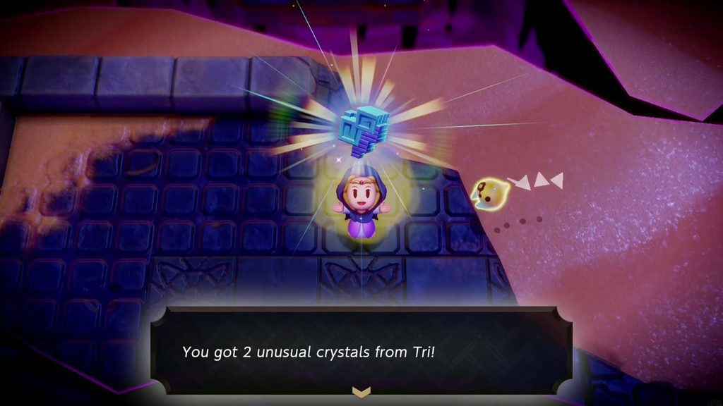 A Rift in the Gerudo Desert - The Legend of Zelda: Echoes of Wisdom Walkthrough 88 Zelda holds up the reward with the text box "You got 2 unusual crystals from Tri!" after freeing all friends.