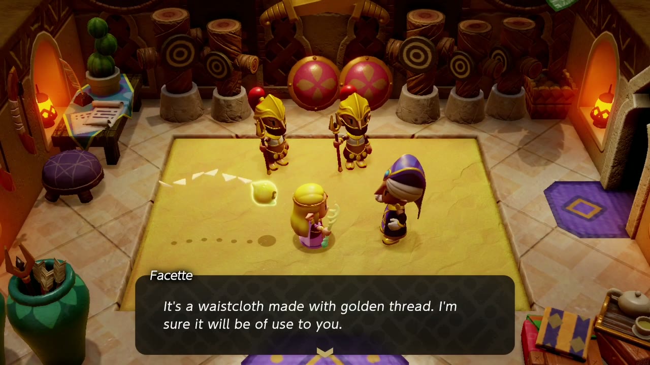 Facette explains the gold sash is a waistcloth made with golden thread. Facette explains the gold sash is a waistcloth made with golden thread.