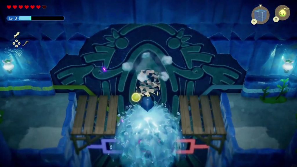 The water jet rises under Zelda and lifts her up to the Jabul Ruins hub's upper level.