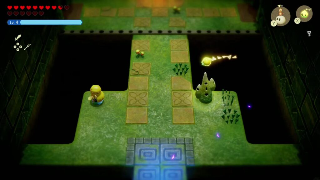 Faron Temple Dungeon - The Legend of Zelda: Echoes of Wisdom Walkthrough 13 The 3F Waypoint statue and blue warp tile on the narrow bridge across a pit in Faron Temple.