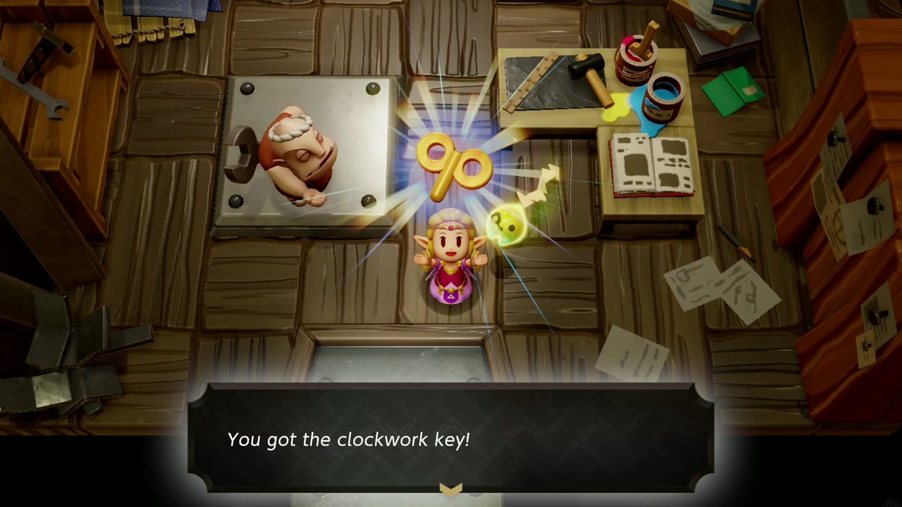 Zelda holds up the clockwork key in Dampé Studio: "You got the clockwork key!" Zelda holds up the clockwork key in Dampé Studio: "You got the clockwork key!"