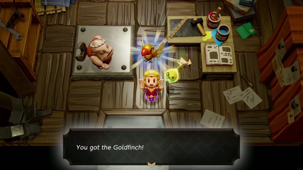 Automatons 39 Zelda holds up the golden Goldfinch with the "You got the Goldfinch!" box