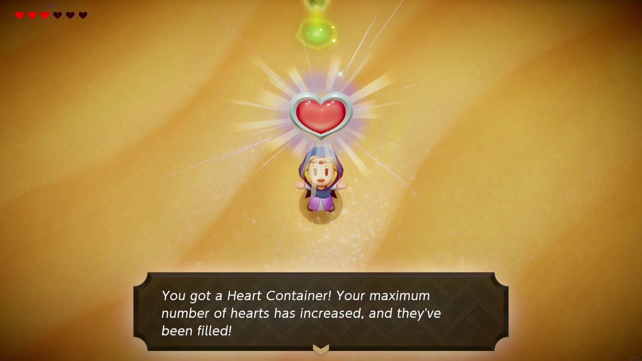 Zelda holds up a Heart Container in the Gerudo Sanctum arena: "You got a Heart Container!" Zelda holds up a Heart Container in the Gerudo Sanctum arena: "You got a Heart Container!"