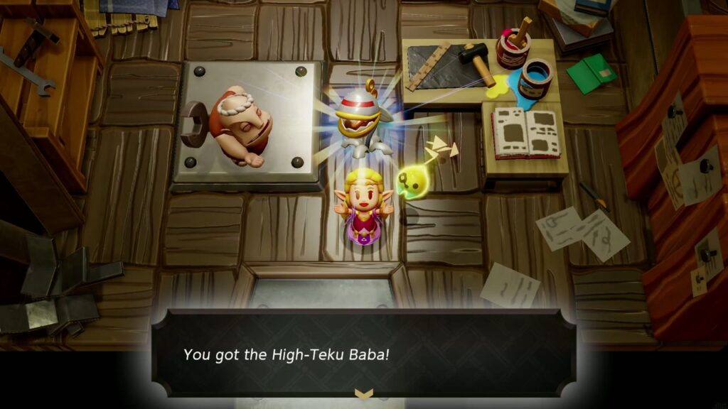 Automatons 30 Zelda holds up the High-Teku Baba in Dampé's studio with the "You got the High-Teku Baba!" box