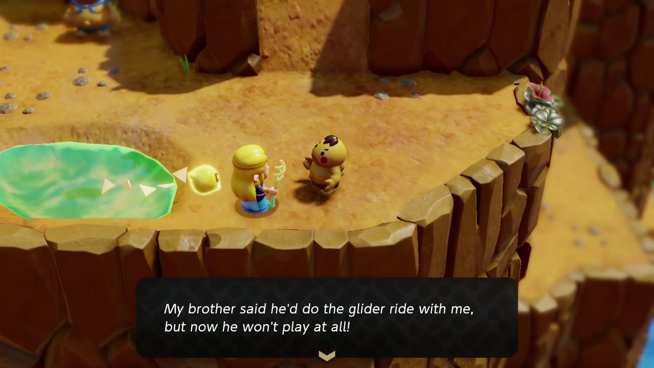 A young Goron on an Eldin Volcano cliff asks Zelda to show him the glider ride. A young Goron on an Eldin Volcano cliff asks Zelda to show him the glider ride.