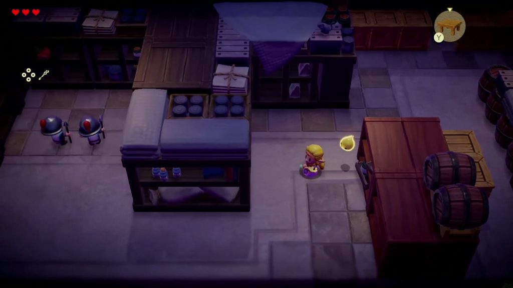 Zelda approaches two guards standing with their backs to her in the next Hyrule Castle storeroom