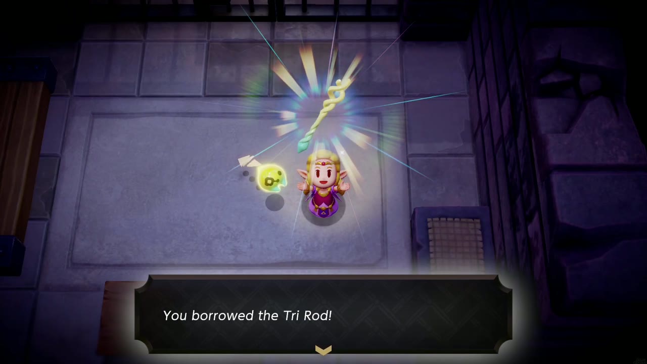 Zelda holds up the Tri Rod in her Hyrule Castle cell with the text box "You borrowed the Tri Rod!" Zelda holds up the Tri Rod in her Hyrule Castle cell with the text box "You borrowed the Tri Rod!"