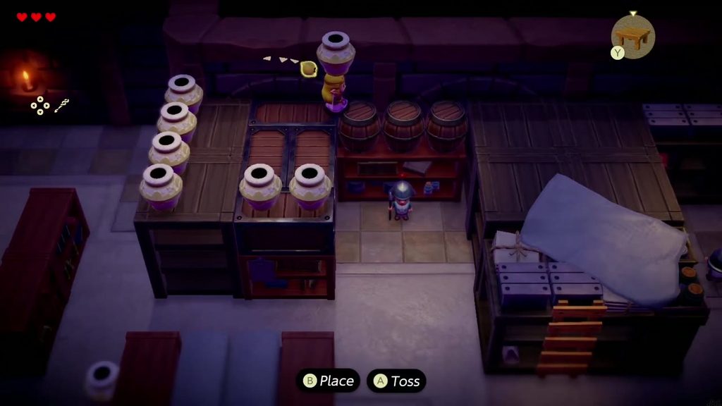Zelda carries a Hyrule Castle Pot echo overhead on the shelves, ready to toss it near the guards