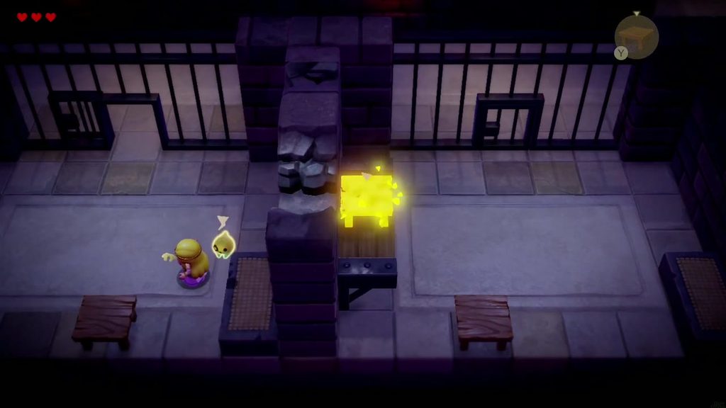 Zelda drops into the neighboring cell after crossing the broken wall from her own