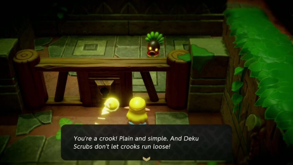 A Rift in the Faron Wetlands - The Legend of Zelda: Echoes of Wisdom Walkthrough 31 Zelda stands behind the bars of the Deku Scrub Lockup as a guard calls her a crook.