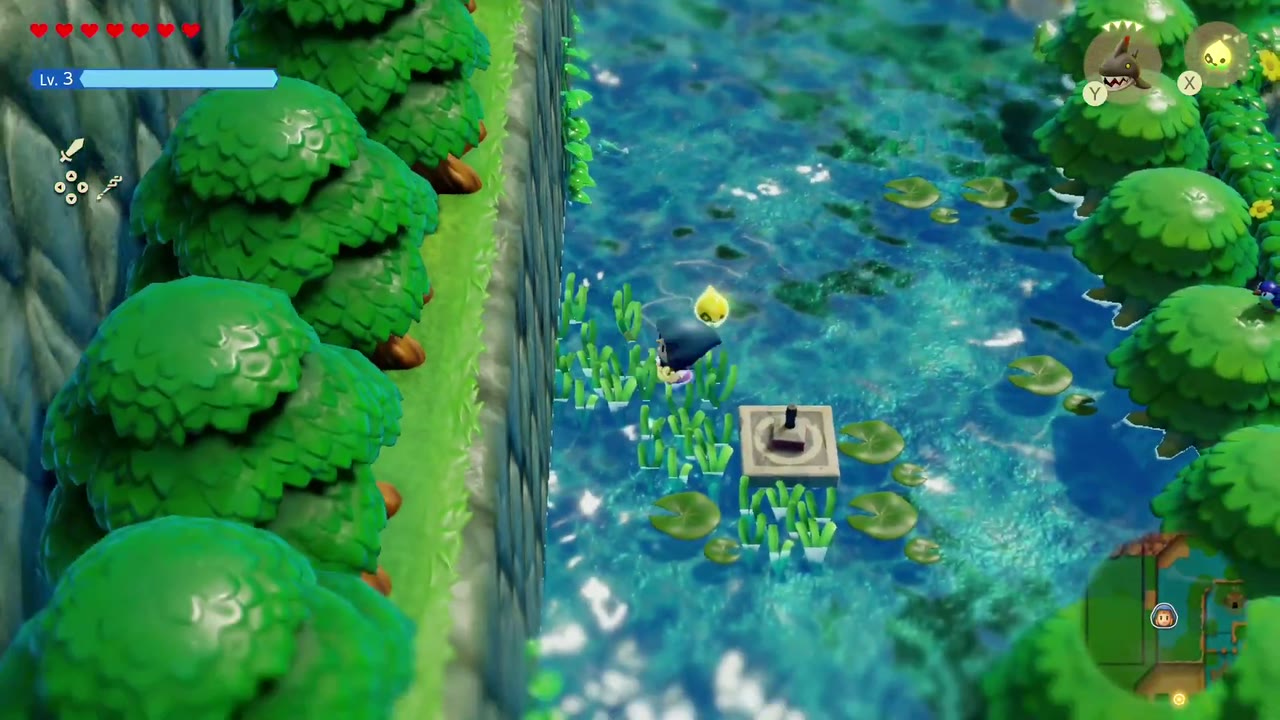 The Jabul Waters Rift - The Legend of Zelda: Echoes of Wisdom Walkthrough 109 The Zora River stamp stand among lily pads below a cliff wall, with Zelda wading toward it.