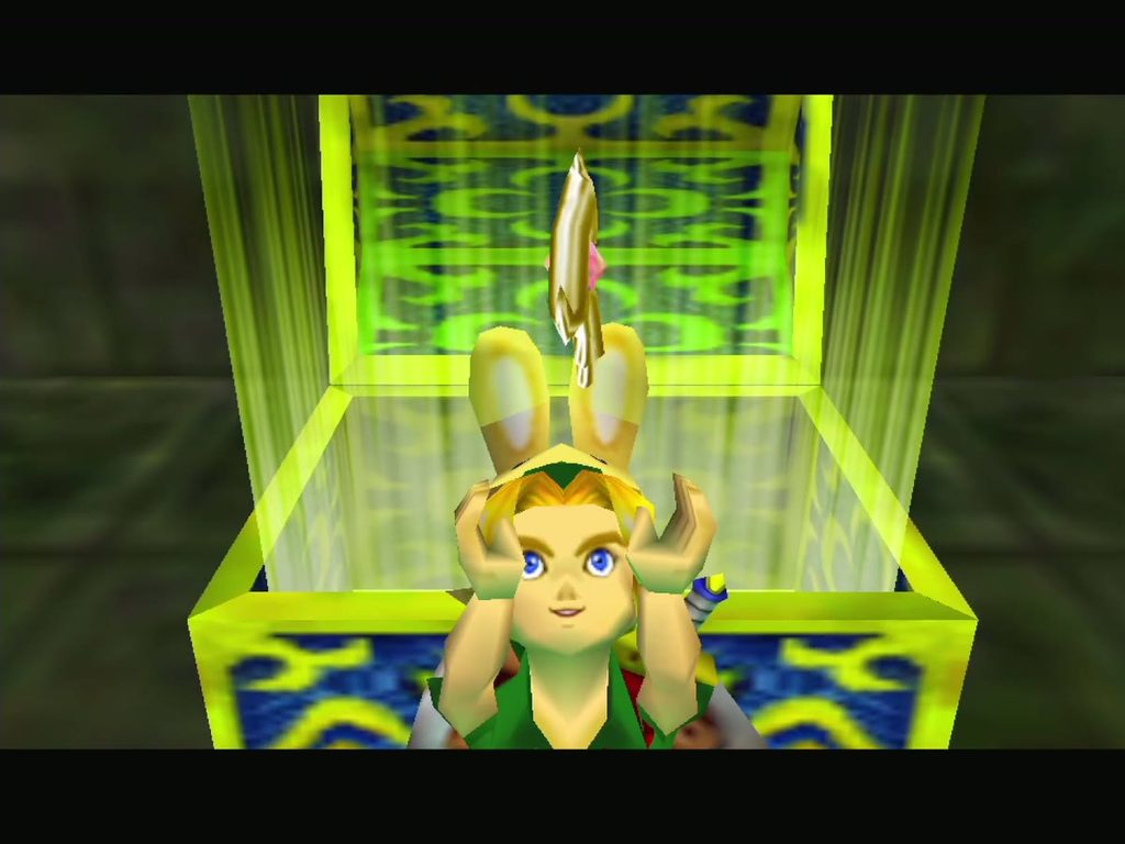 Link holds up the Woodfall Temple Boss Key. Link holds up the Woodfall Temple Boss Key.