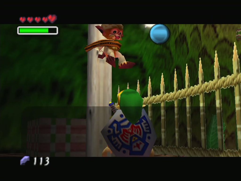 Normal Link stands at the post where the monkey is tied, trying to cut its ropes.