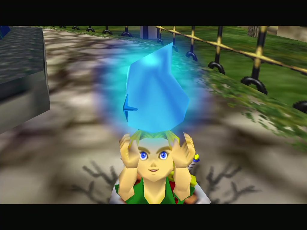 Link holds up the Moon's Tear picked up outside the Astral Observatory. Link holds up the Moon's Tear picked up outside the Astral Observatory.