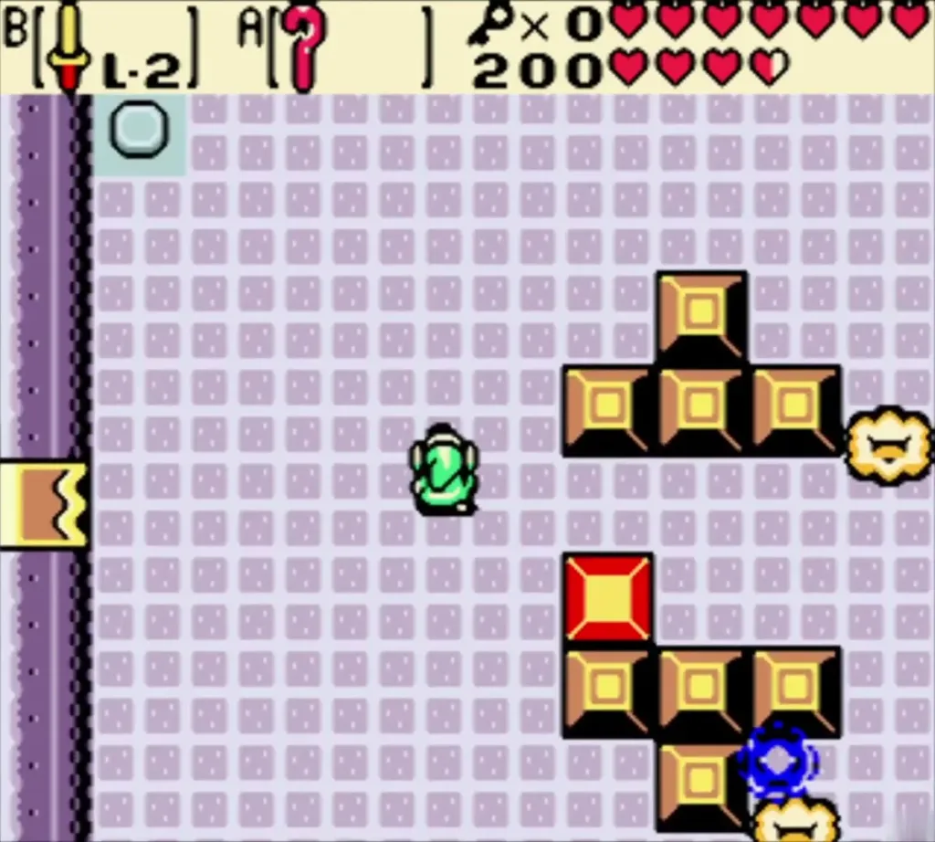 Link beside a red Cane of Somaria block while a blue blob and pieces drift