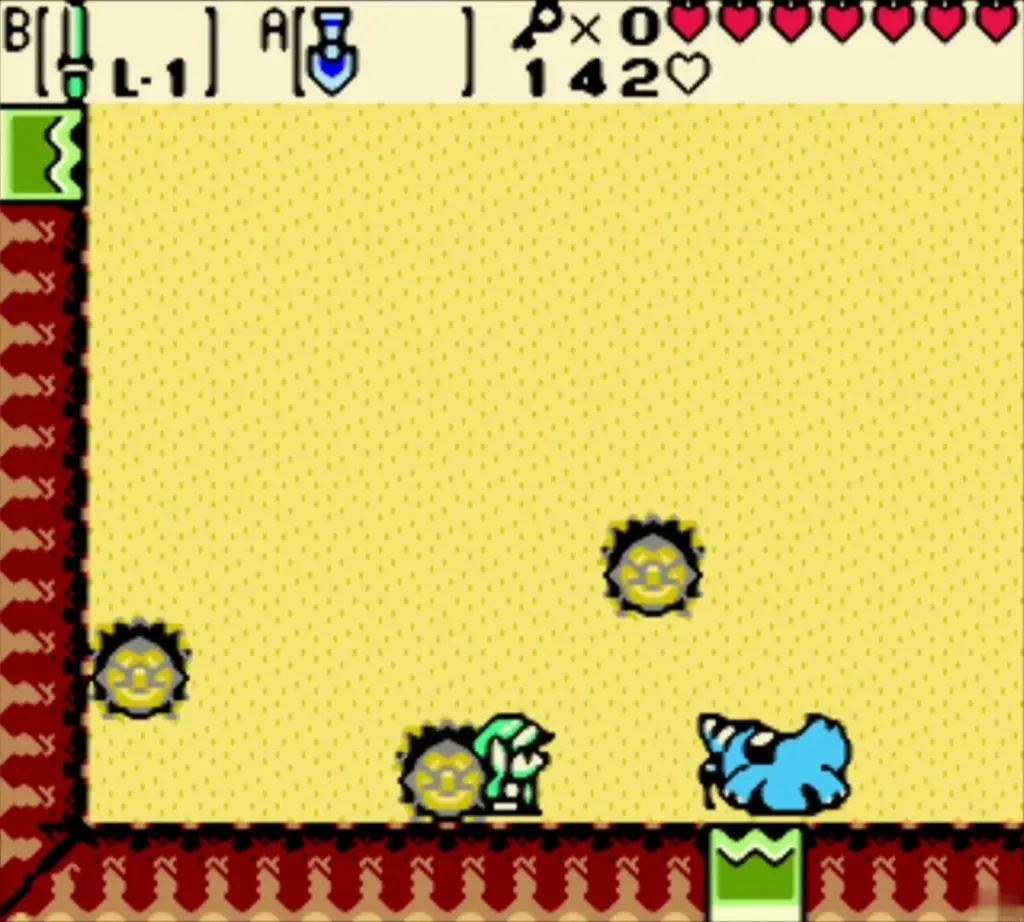 Blue Subterror bursting from the sand beside Link in its room