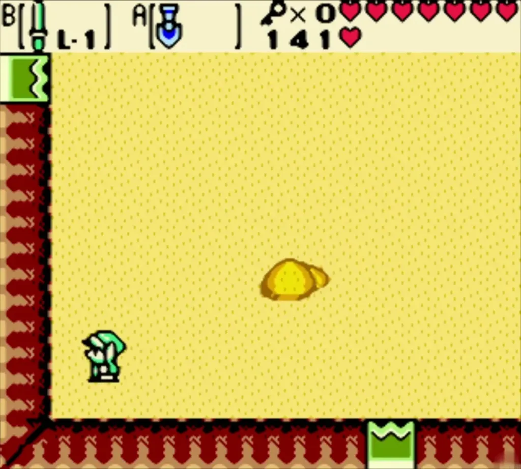 Link on the yellow sand of the Subterror room with a sand mound where the monster hides