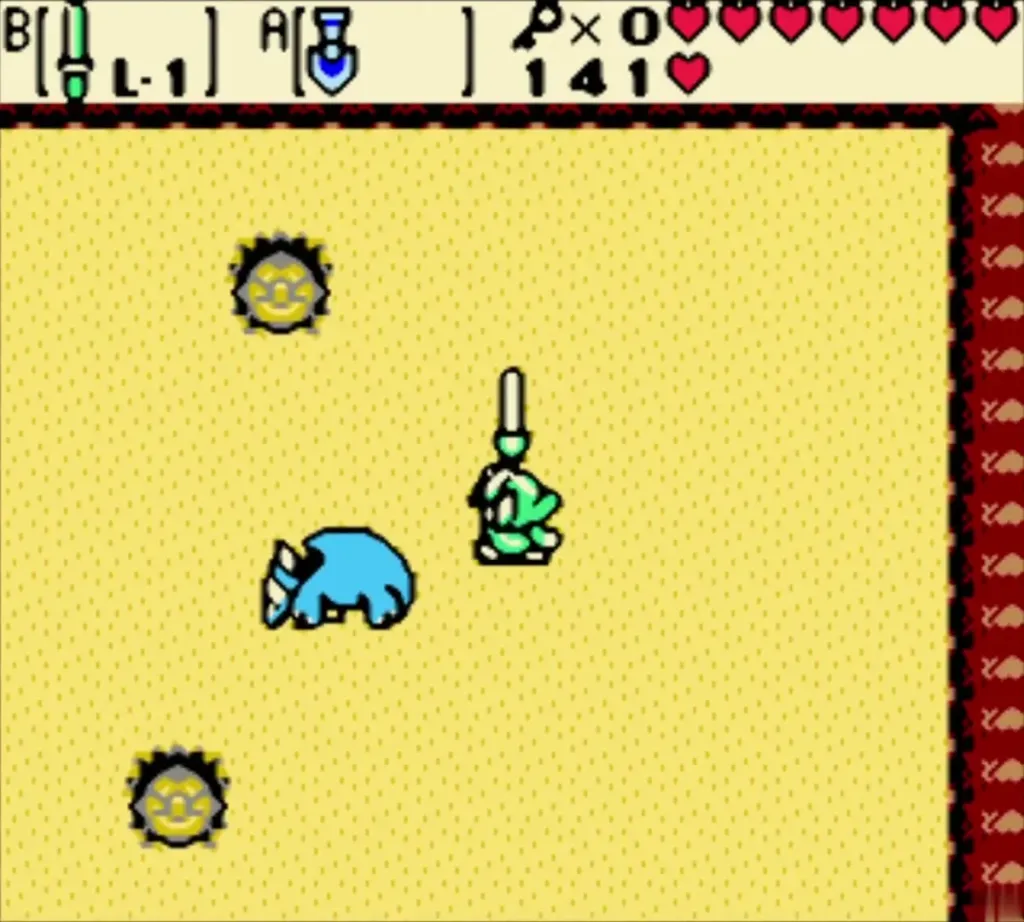 Subterror, the blue sand burrower, on the sand floor of Moonlit Grotto as Link raises his sword