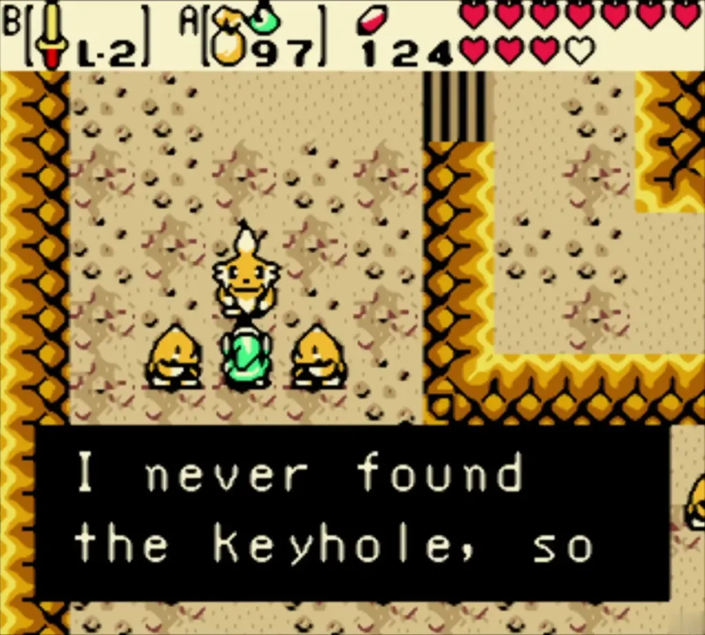 The Goron Elder speaking to Link in the sand pit about the keyhole The Goron Elder speaking to Link in the sand pit about the keyhole