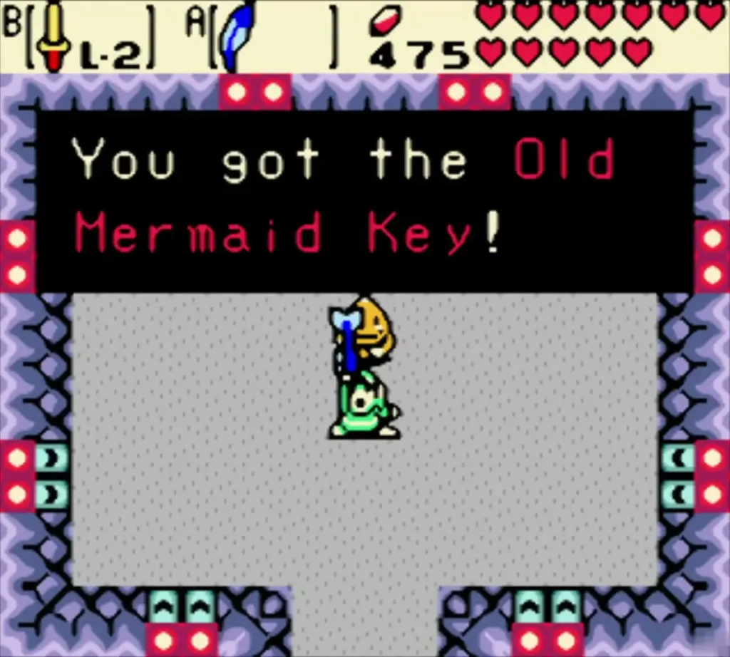 Link holding up the Old Mermaid Key with the complete item box after the Big Bang game Link holding up the Old Mermaid Key with the complete item box after the Big Bang game