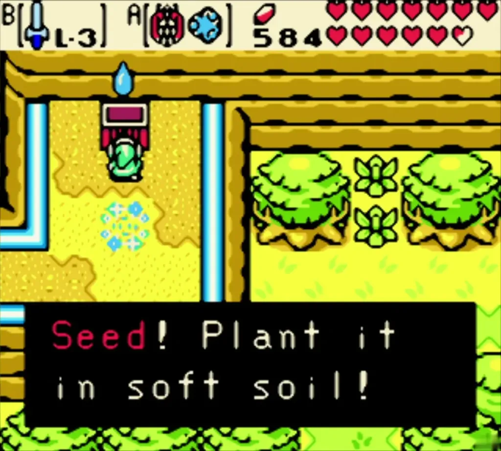 Link beside the opened chest with the Gasha Seed box telling him to plant it in soft soil Link beside the opened chest with the Gasha Seed box telling him to plant it in soft soil