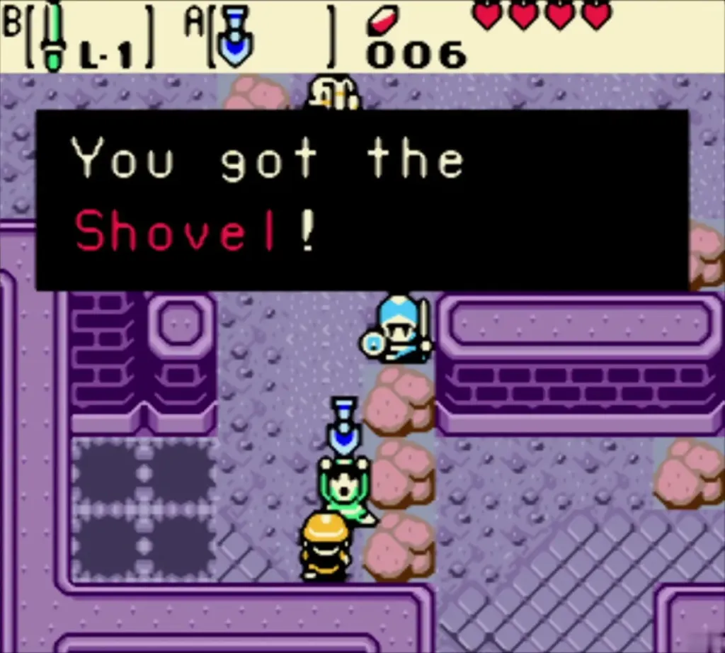 Link holding up the Shovel with the item message fully shown