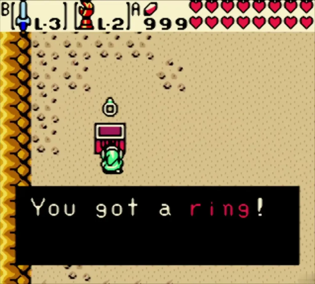 Link holding up a ring after opening the sand chest, with the item message shown Link holding up a ring after opening the sand chest, with the item message shown