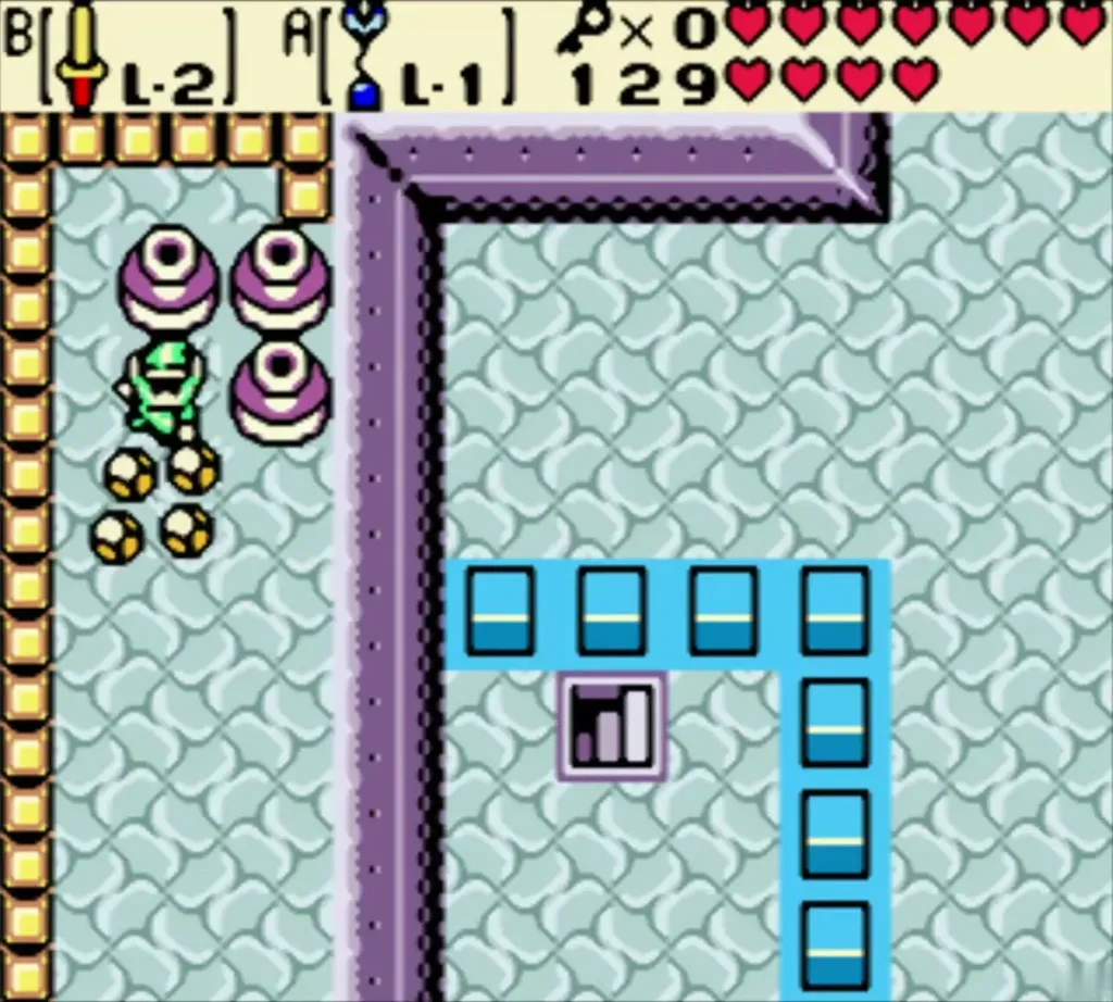 Blue blocks raised around the crystal switch with Link on the ledge Blue blocks raised around the crystal switch with Link on the ledge