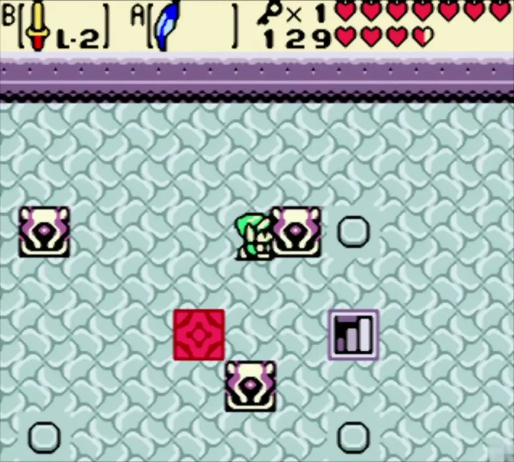 Link pushing a skull-faced block beside the red floor button Link pushing a skull-faced block beside the red floor button