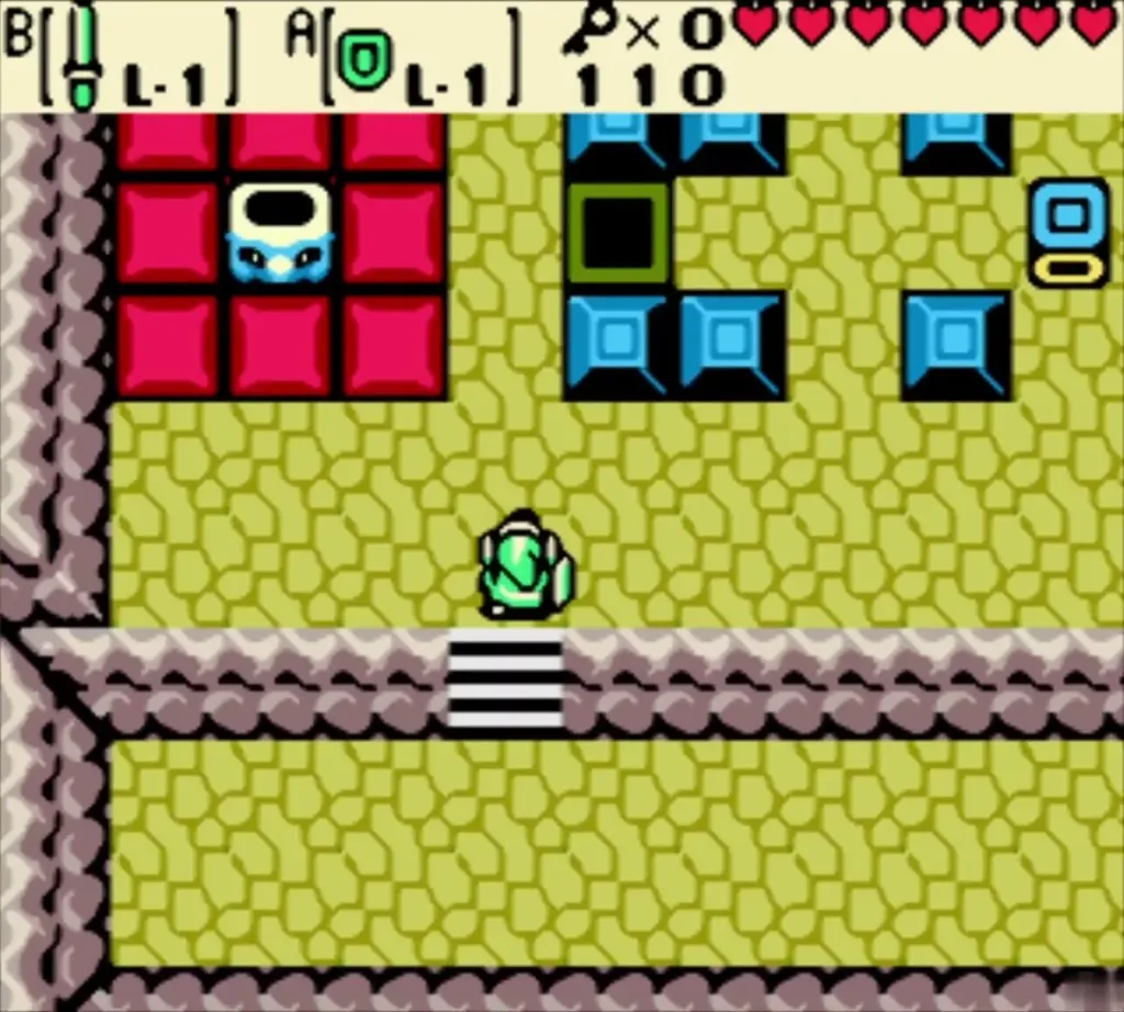 Link at the stairs below a room of red and blue raised blocks Link at the stairs below a room of red and blue raised blocks
