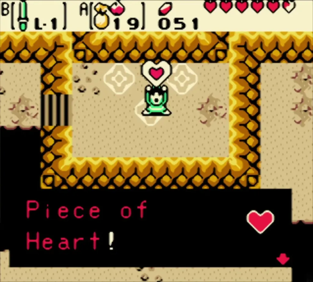 Link holding up the Piece of Heart with its message box Link holding up the Piece of Heart with its message box