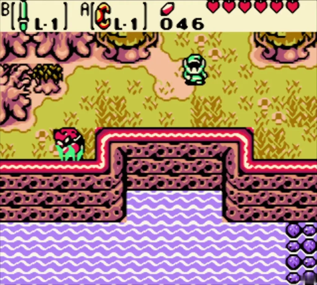 Link near the lone tree beside the water with an Octorok below Link near the lone tree beside the water with an Octorok below