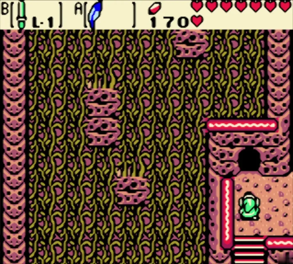 Link at the rocky ledge below the dark cave entrance Link at the rocky ledge below the dark cave entrance